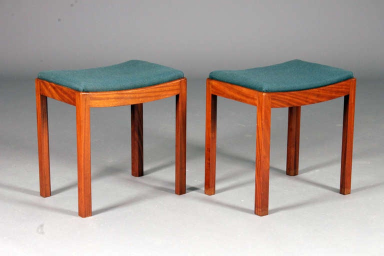 Pair of Stools by Danish cabinetmaker.
1940's
Cuban mahogany & wool upholstery.
Nice  condition.