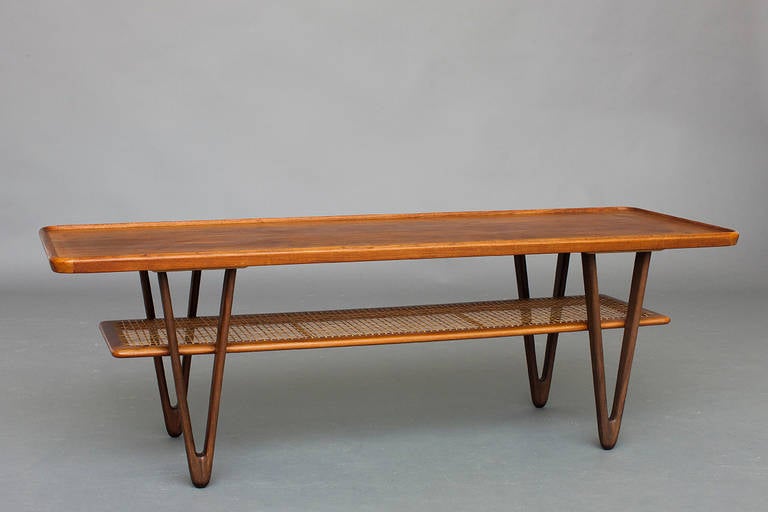 Coffee table.
Danish modern.
Teak and cane.
Nice vintage condition.