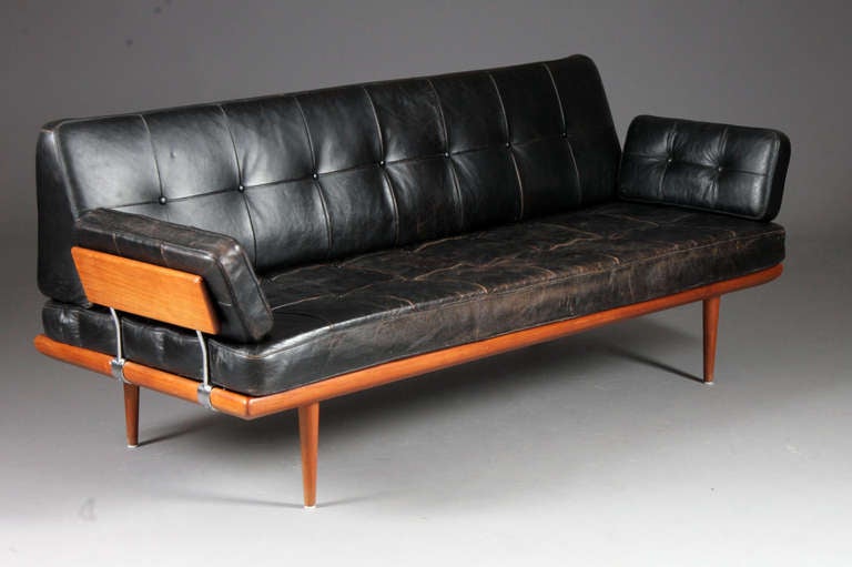 Peter Hvidt & Orla Molgaard for France & France.
Sofa, 3-seater.
Model: Minerva.
Design 1955
Teak & original black leather.
Nice vintage condition.