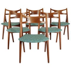 A set of 6 sawbuck chairs