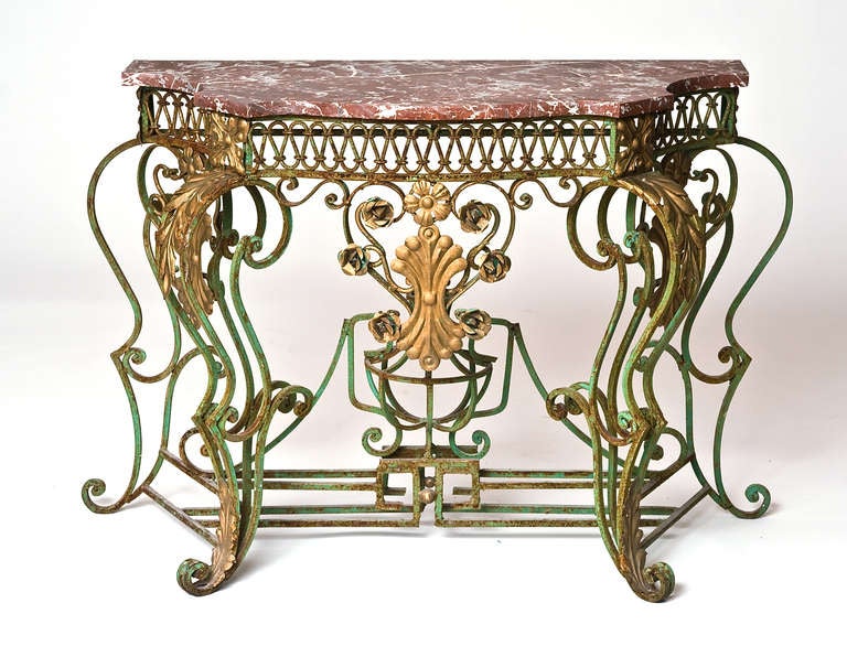 A fine wrought-iron console table with a marble top, France mid 20th century.