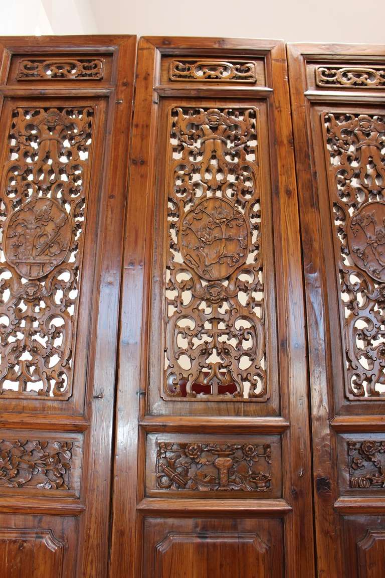 This one of a kind survived and only known room divider-paraent comes from Pinyin Gugong in Beijing, the forbidden town.  It was brought to Europe during the british occupation in the 1860's.  It is hand carved with the motives of the imperial