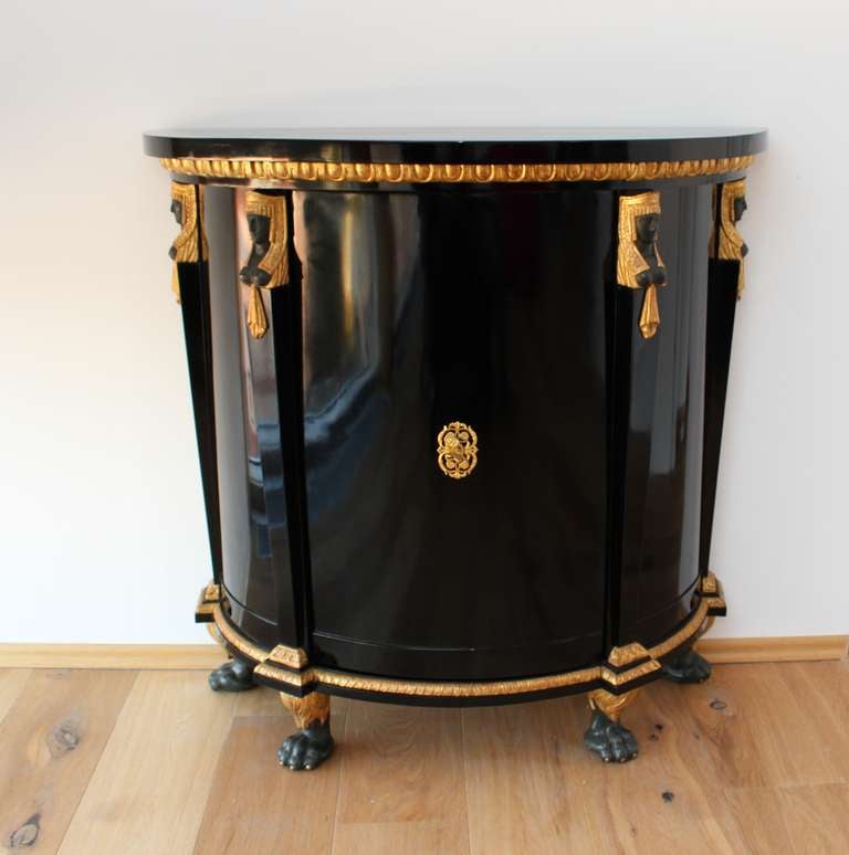 Fine Ebonized pearwood veneered, demi lune Trumeau Cabinet.
Czech origin from Carlovy Vary around 1805-1810. Typical for the Austrian Hungarian Empire. This type of furniture was mainly produced in Vienna, Budapest and Prague, as a rivival of
