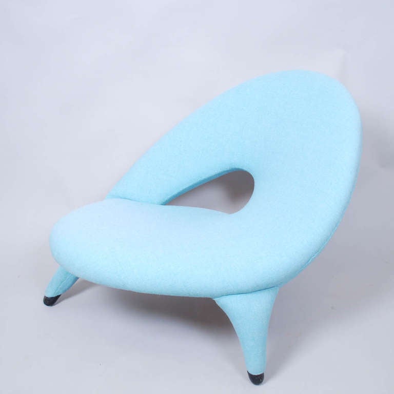 Arabesk lounge chair designed by Folke Jansson for S M Wincrantz, Skövde, Sweden. 1955.
This chair is from the first edition with wooden feet. 
Reupholstered.
Only as few as 100-150 chairs were ever produced by Wincrantz.