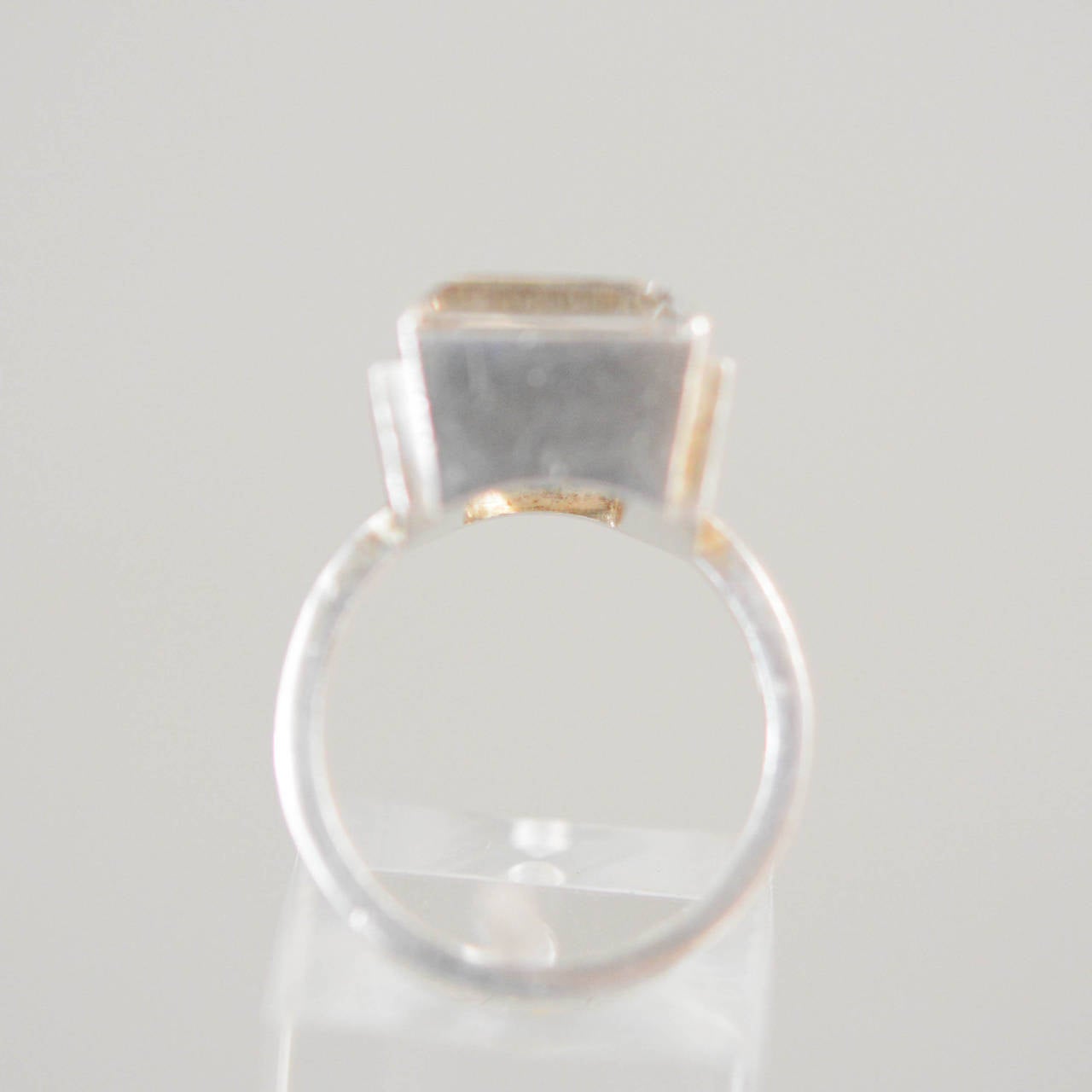 A Wiwen Nilsson sterling silver and rock crystal ring. Lund, Sweden. Dated, 08, 1940.

Size: 16 1/2 mm.