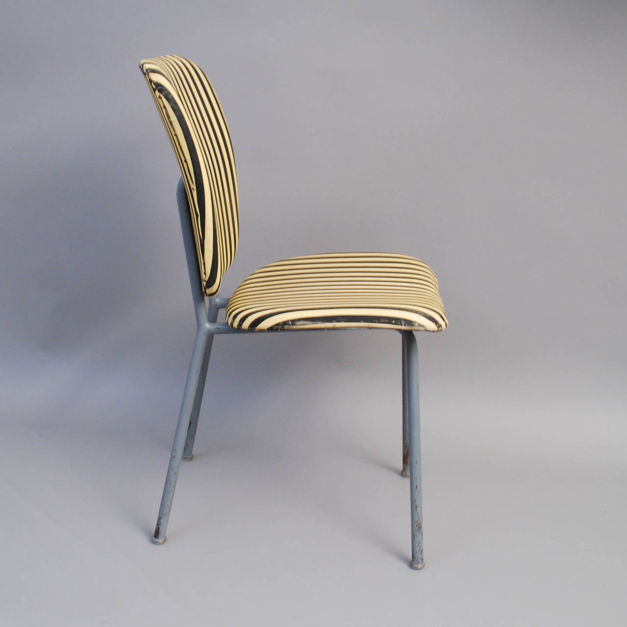 An industrial chair by Verkstads Aktiebolaget Lindqvist, Motala Sweden. 1940-50s.
 Greypainted metalframe and yellow/black striped vinyl upholstry.