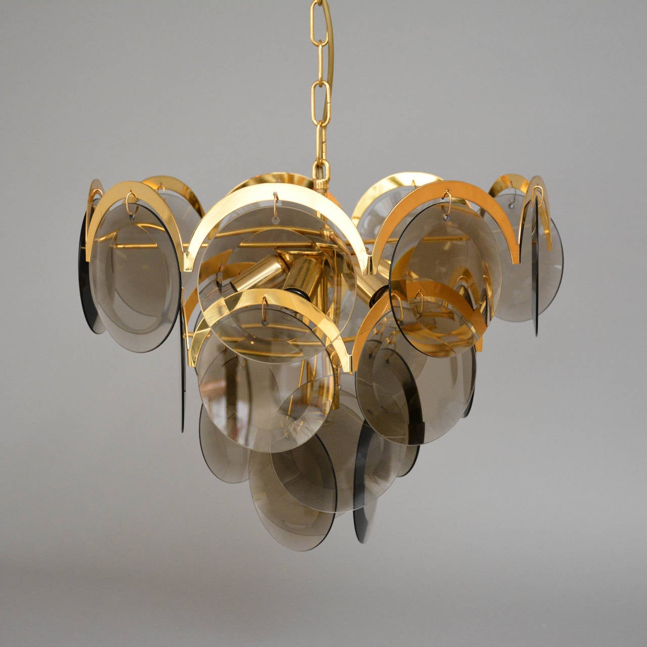 Ceiling lamp brass and facet cut smoked brown glass. 18 glass prisms. Seven points of light, Italy, 1960s-1970s.