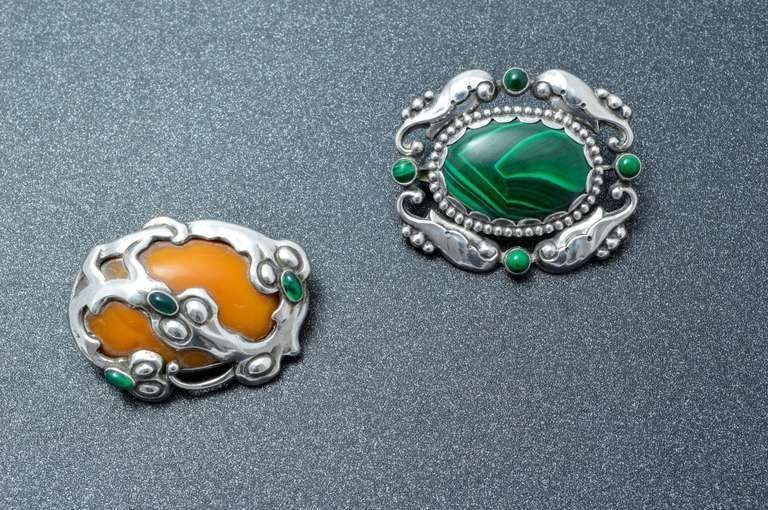 Two rare and beautiful brooches made by Silversmith Kay Bojesen. 

Pieces from a master craftman in full blossom. Distinct playful figures and patterns welcome the modern movement in the time of transition in Scandinavia. 
Expertly crafted one