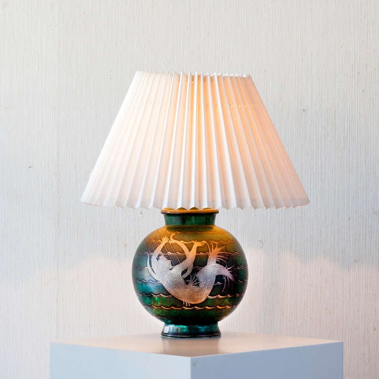 A rare Argenta lamp designed by Wilhelm Kåge at Gustavsbergs porcelain factory in 1935 . Sign HAND DREJAD ARGENTA 1045 III GUSTAVSBERG KÅGE E. Hight in total ca 52cm.