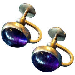 20th c.A par of Ear rings in 18k gold and amethyst by Wiwen Nilsson