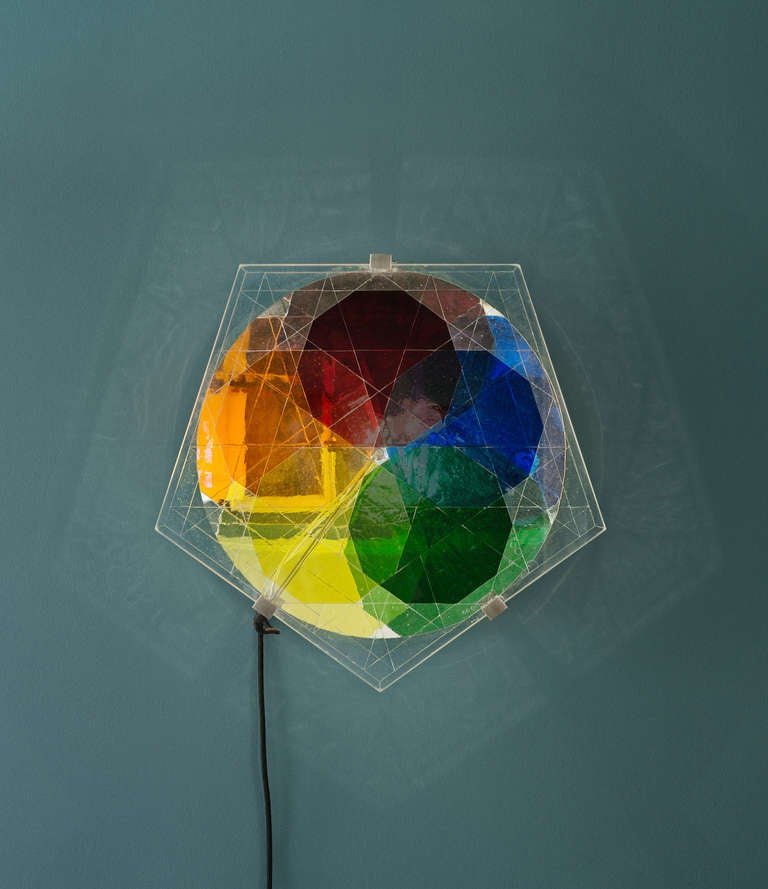 Five-fold colour wheel. 2006. From an edition of four. Stainless steel, glass, mirror, bulb, electrical cable/fittings.