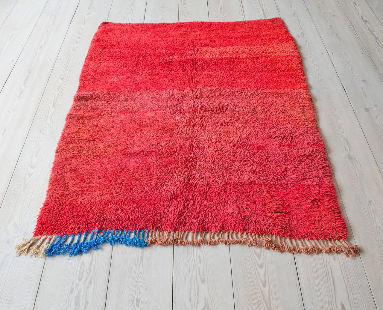 Amazing Middle Atlas wool rug. Shades of red and blue and brown tassels.