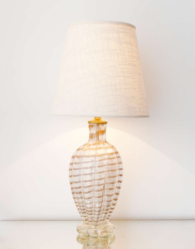 Murano glass table lamp with swirling stripes, brass fitting and new linen shade. Available individually or as a pair.