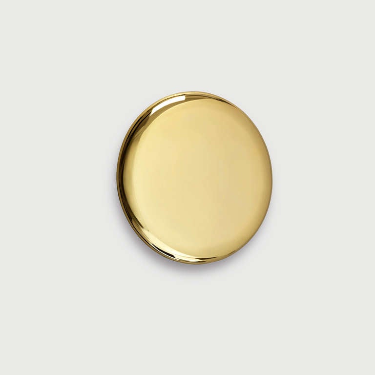 Beauty mirror, designed by Michael Anastassiades in 2010. Hand finished gold plated stainless steel.