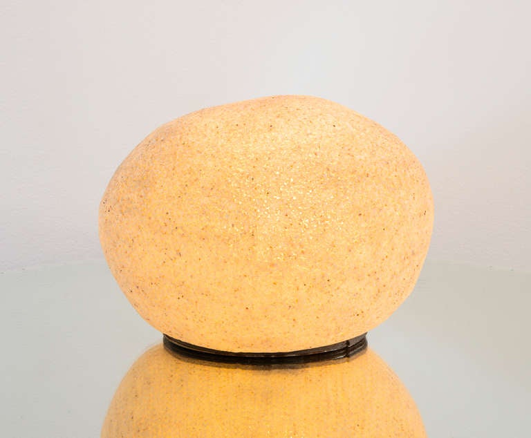 Handcrafted 1970s rock lamp. Marble powder on polyester.