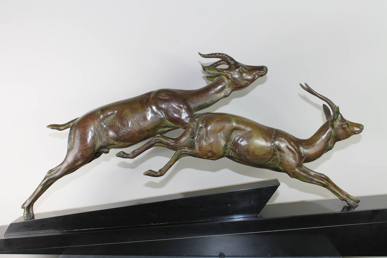 Hand-Crafted Bronzed Running Antelopes on Marble Base, circa 1930