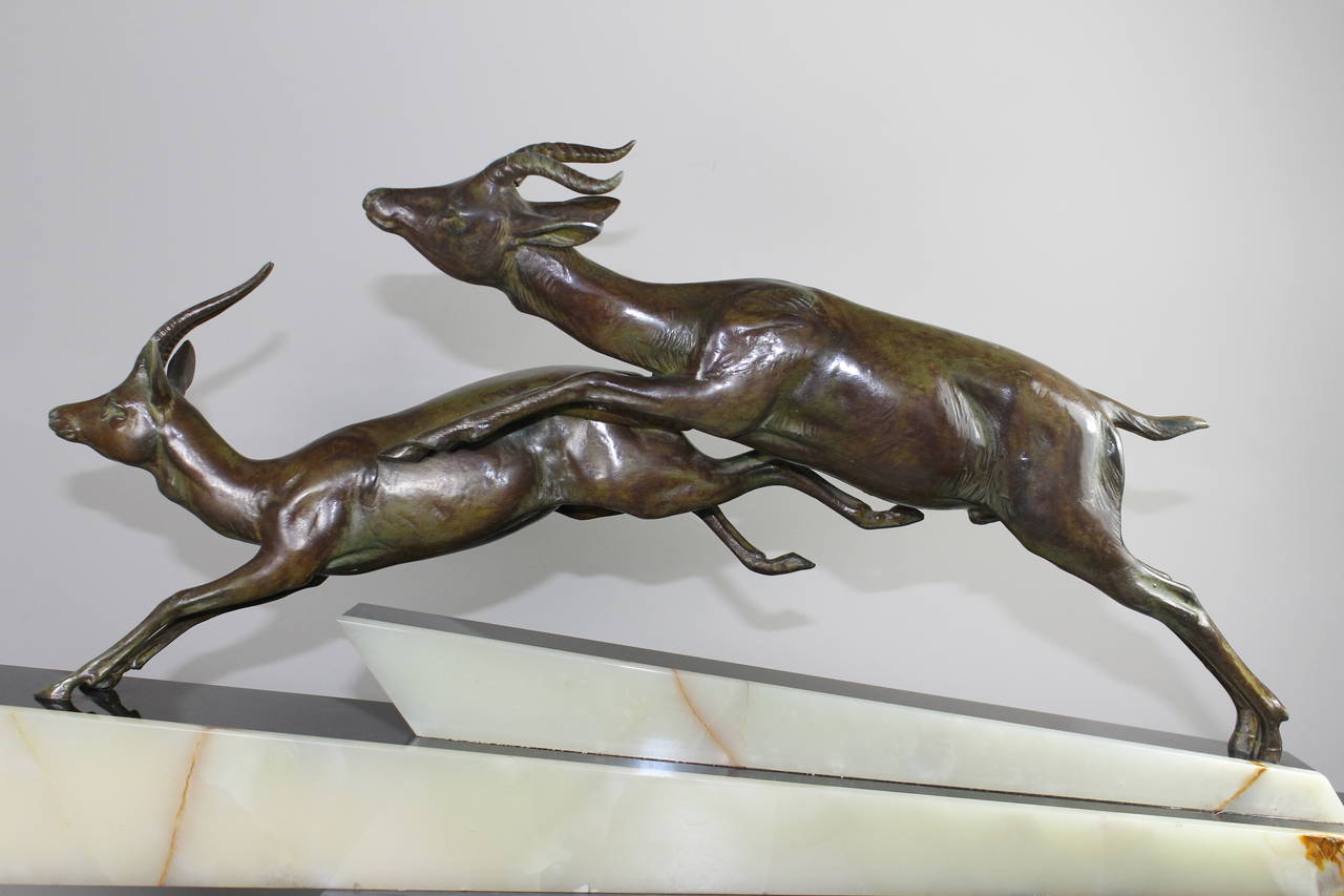 Bronzed Running Antelopes on Marble Base, circa 1930 In Good Condition In Sint Annaland, NL