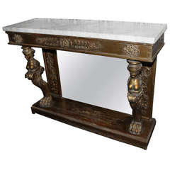 An Italian Woodcarved and Gilded Console