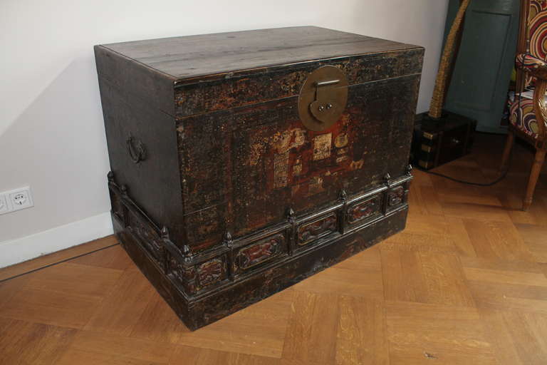 Woodcarved and painted Chinese chest decorated with animals, circa 1930.