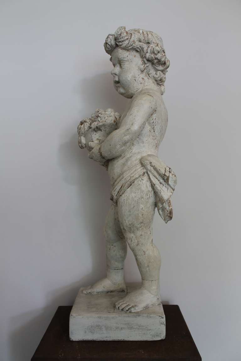 Wood Carved In Pine With White Polychrome Putto.