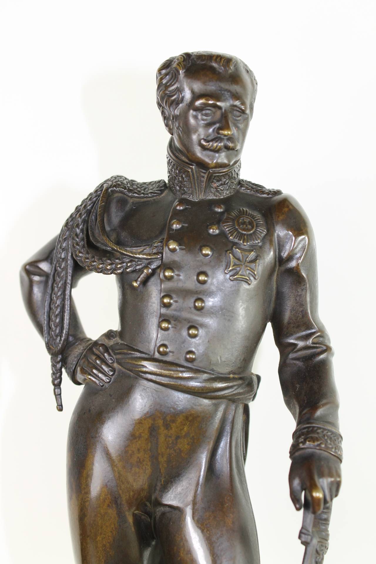 A German Officer, Leaning on his Saber, in Bronze, Standing on a Carrara Marble Base. Very Detailed