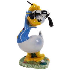 "Donald Duck Golfing, " a Ceramic Disney Figurine by Zaccagnini, Florence c. 1940
