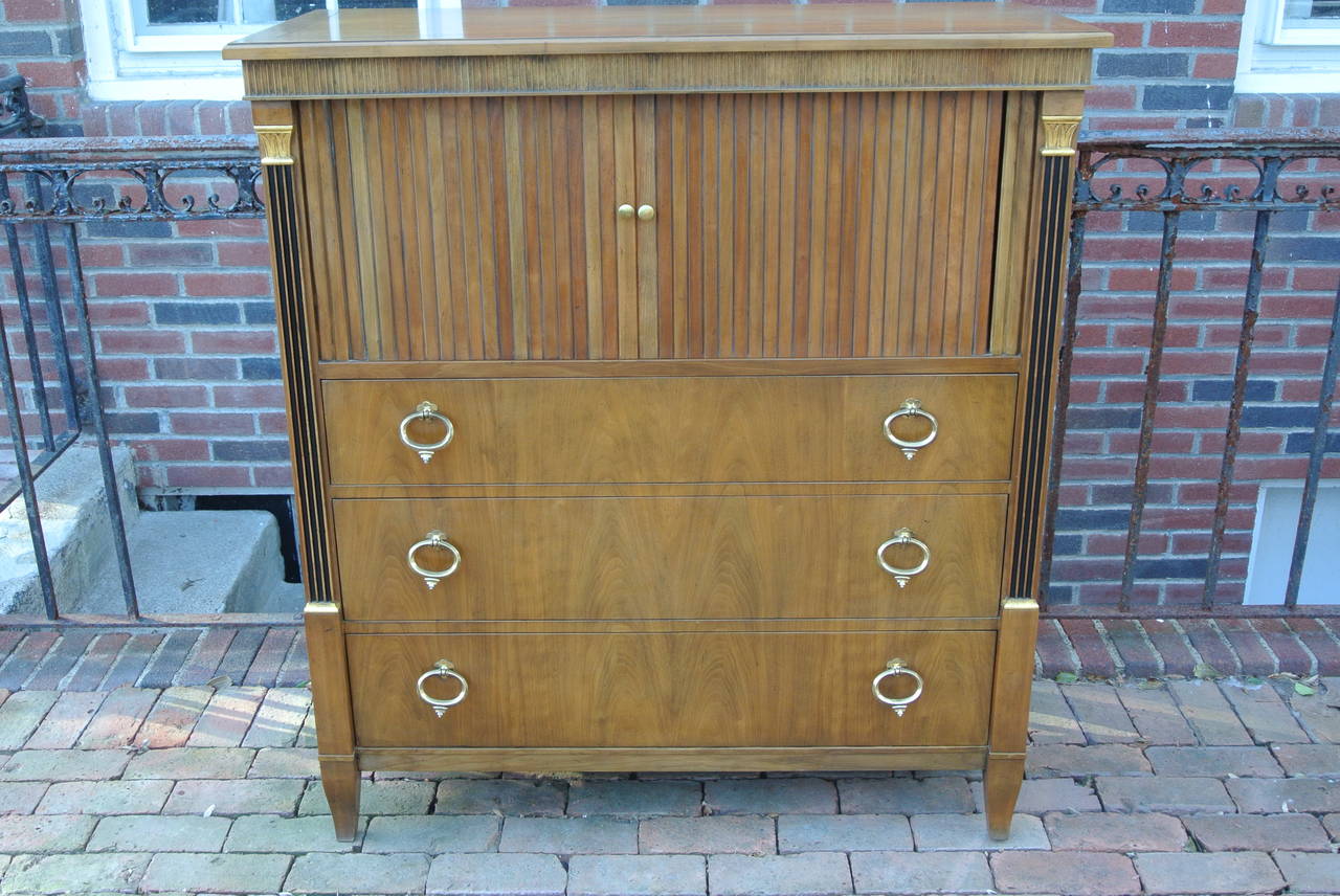 Gentlemans chest by. Baker. Tamboor doors open to two dividers sit atop three drawers w. Italian Solid Brass pulls.