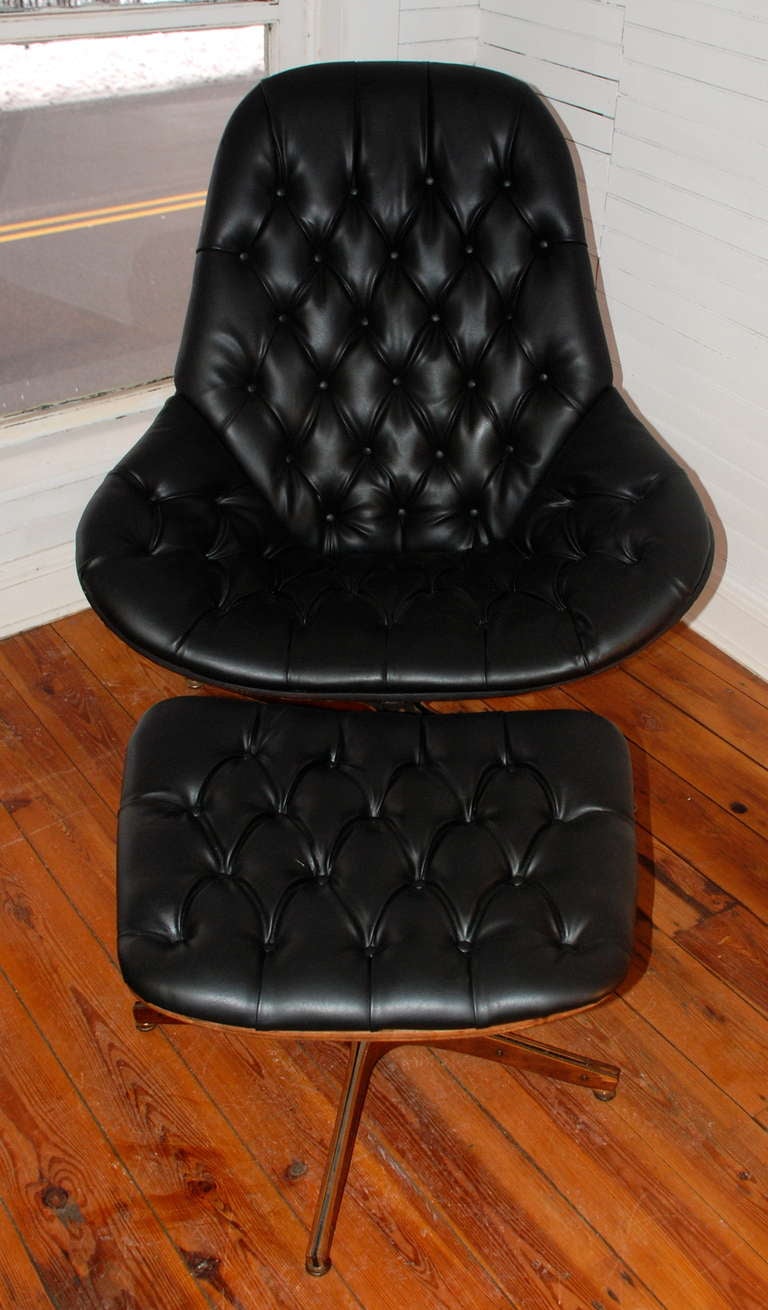 Plycraft Bentwood tufted lounge chair newly re-apholstered in black vinyl. Bentwood Star Base