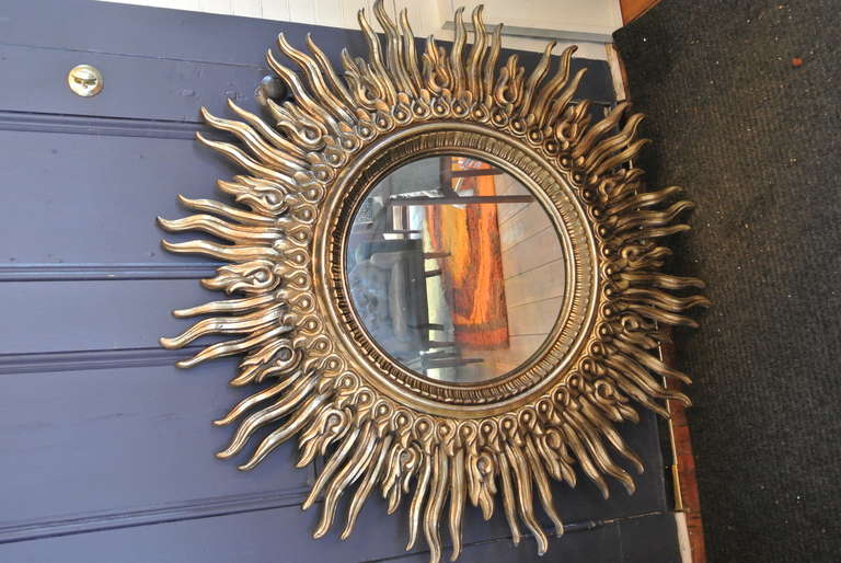 20th Century Large Convex Mirror on Gilded Resin Sunburst Frame