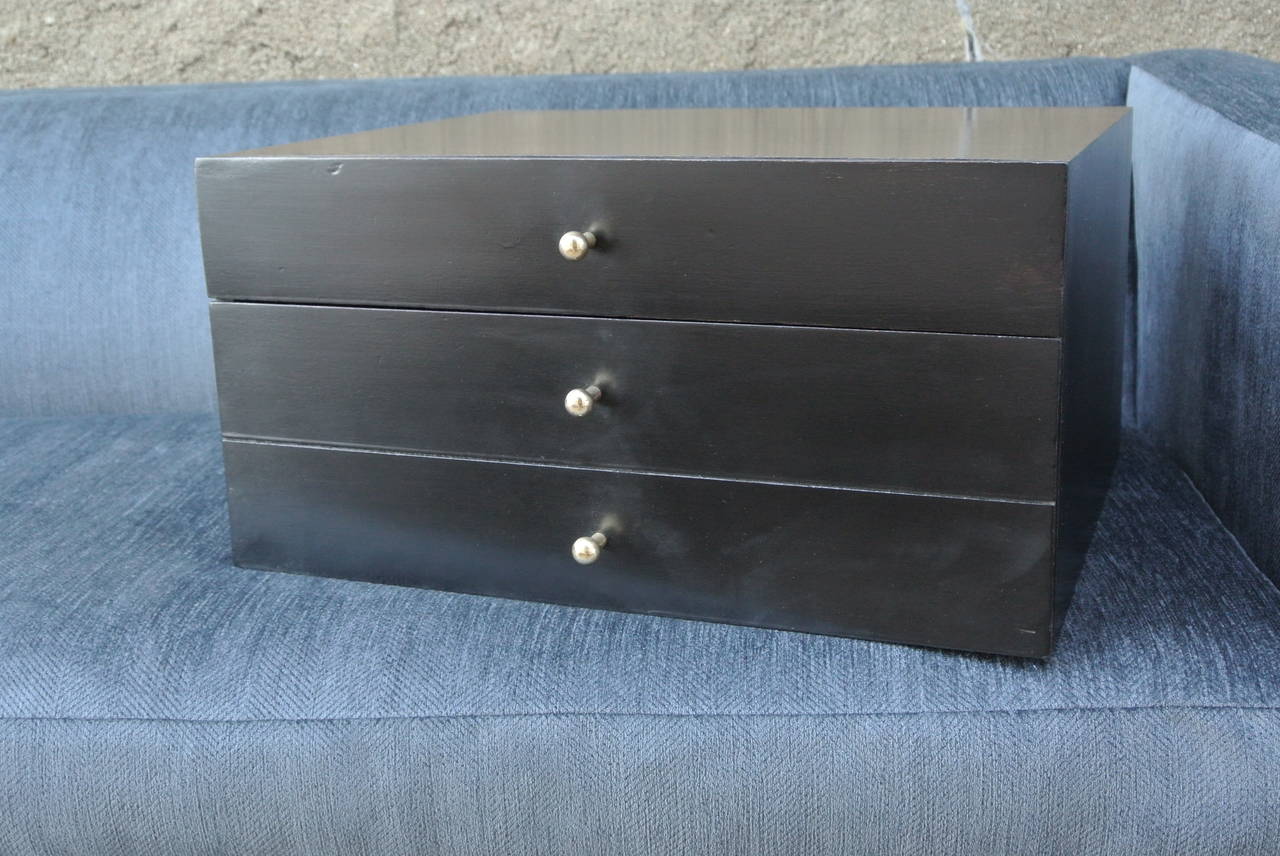 Two Drawer Ebonized Jewelery box w. polished brass pulls by Harvey Probber