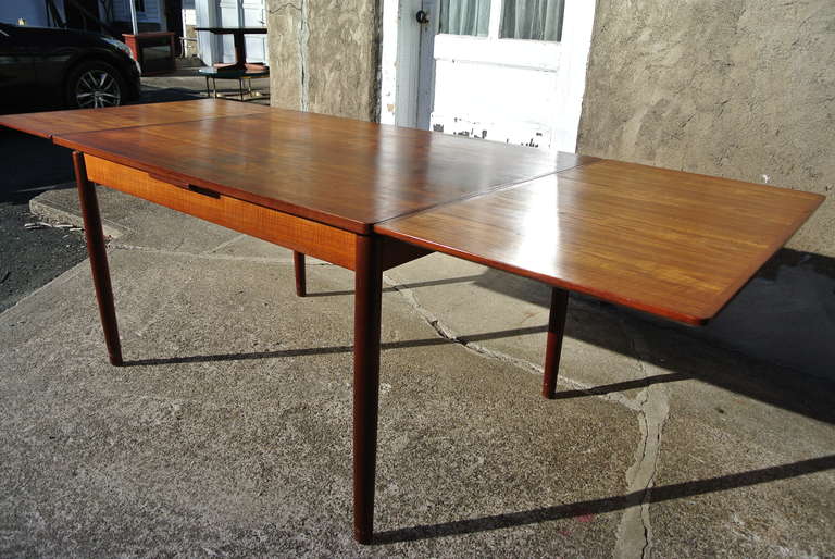 Mid-Century Modern Thorald Madsen Teak Dining Table with Pocket Leaves