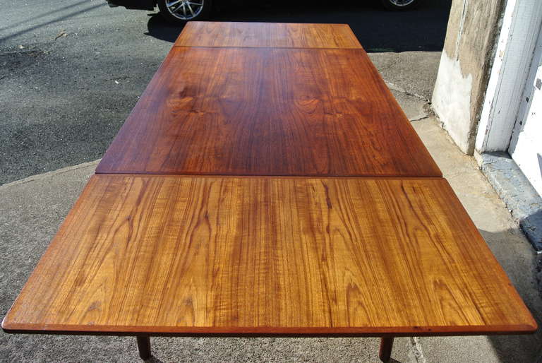 Thorald Madsen Teak Dining Table with Pocket Leaves In Excellent Condition In Morristown, NJ