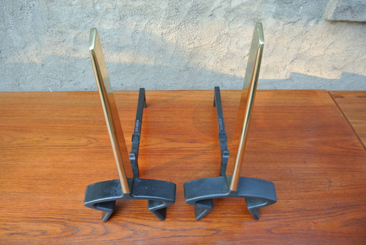 Pair of Brass and Cast Iron Saber Andiron by Donald Deskey for Bennett