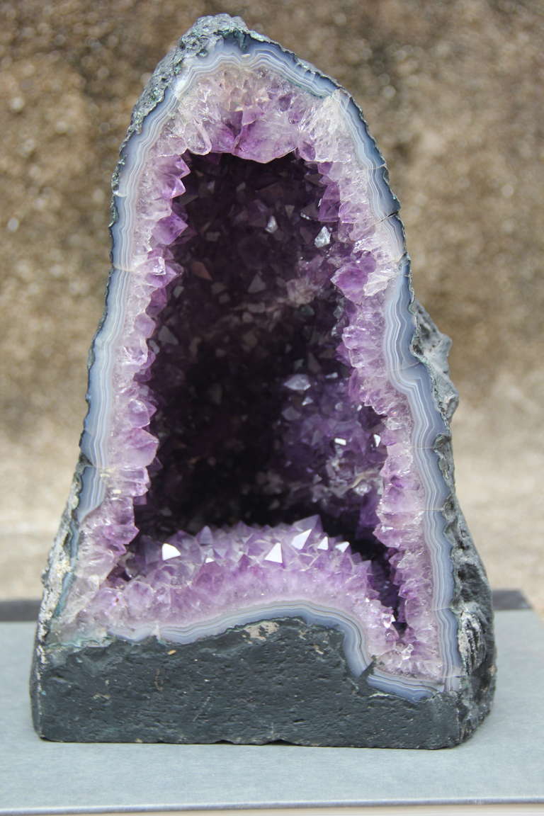 Brazilian amethyst crystal geode specimen.