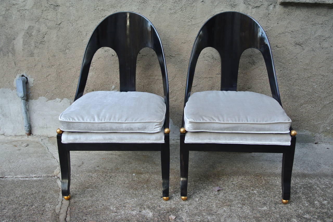 Pr. of Neoclassic Spoonback Chairs by Michael Taylor for Baker. Newly refinished in ebony with newly reupholstered velvet cushions.