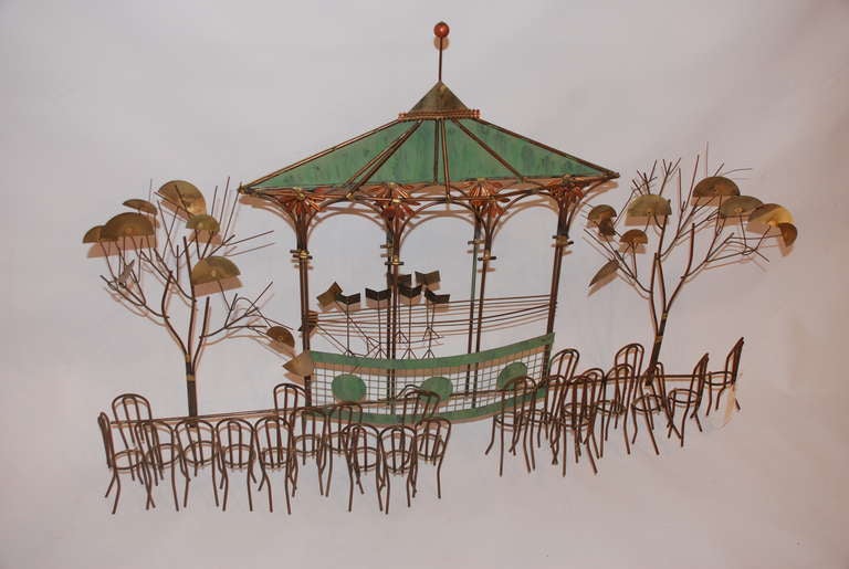 Once again, Jere hits the bulls-eye with this witty and thoughtful three dimensional rendering of a quaint little gazebo located in a park. Today it is set up with music stands, probably for some locally important event such as a graduation ceremony