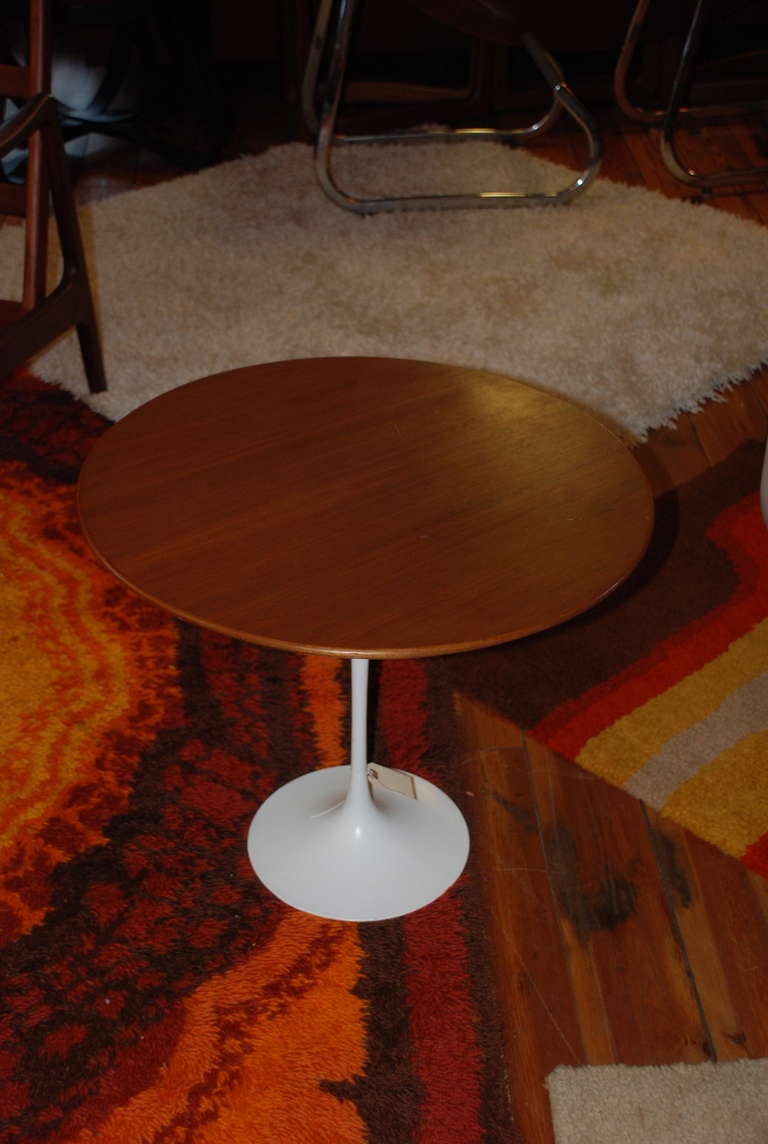 Eero Saarinen's tulip side table for Knoll
Original walnut top with heavy cast iron base.