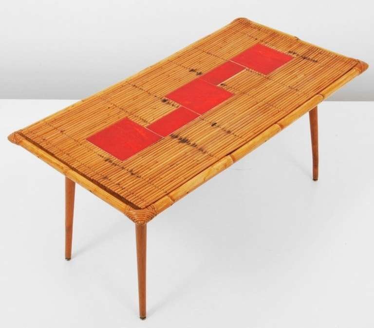 For nearly three decades in the middle of the 20th century, Roger Capron crafted some of the most beautiful glazed ceramic tile work, pottery and ceramics produced in France. This table was one of a handful of bamboo and wood tables created by