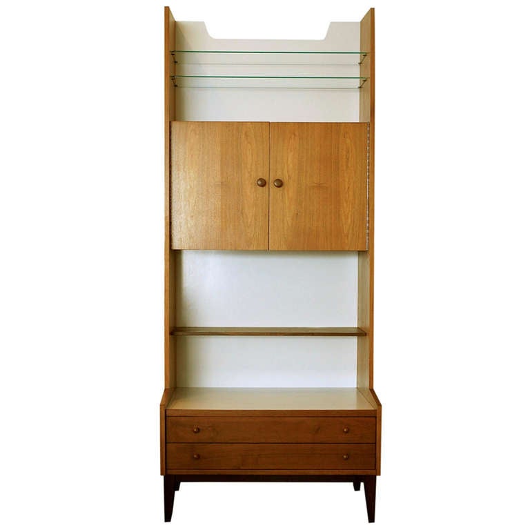 Kipp Stewart and Stewart MacDougall collaborated in designing dozens of iconic pieces for Glenn of California in the mid-1950's. Initially marketed as a door-height 