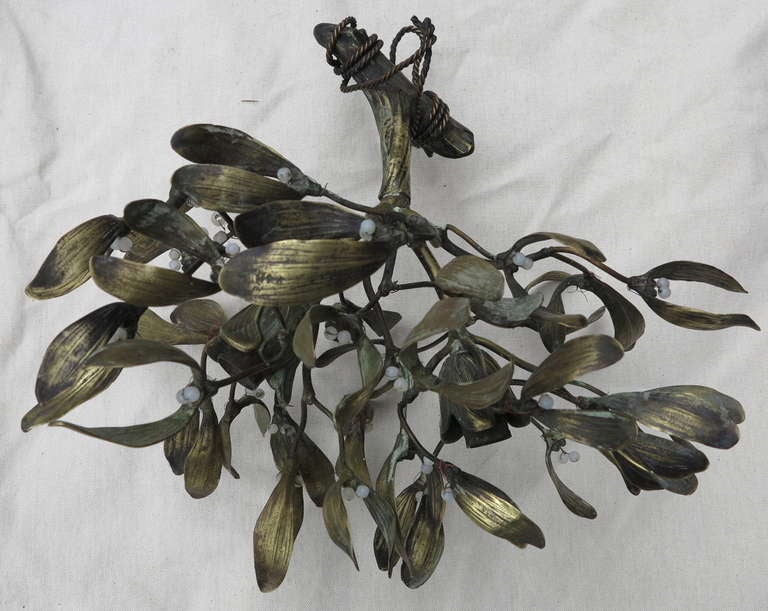Bronze mistletoe chandelier with opaline beads.
