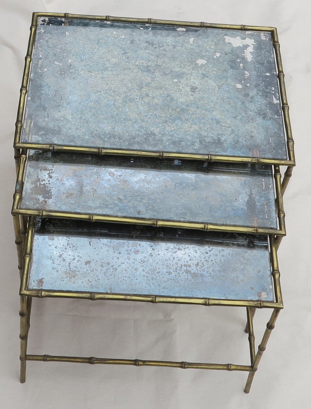 Three Nesting Tables with Oxidized Mirror Top 1