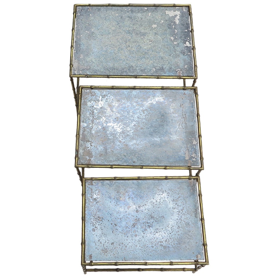 Three Nesting Tables with Oxidized Mirror Top