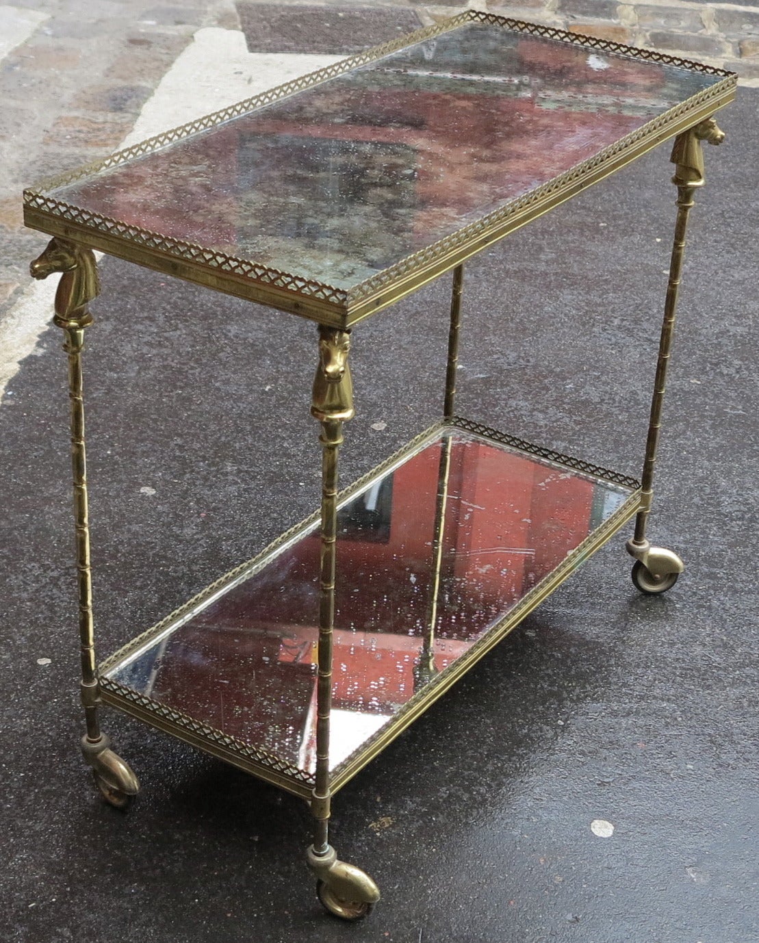 Gilt 1970 Rolling Shelf with Horse Head in Brass in the Style of Maison Bagués