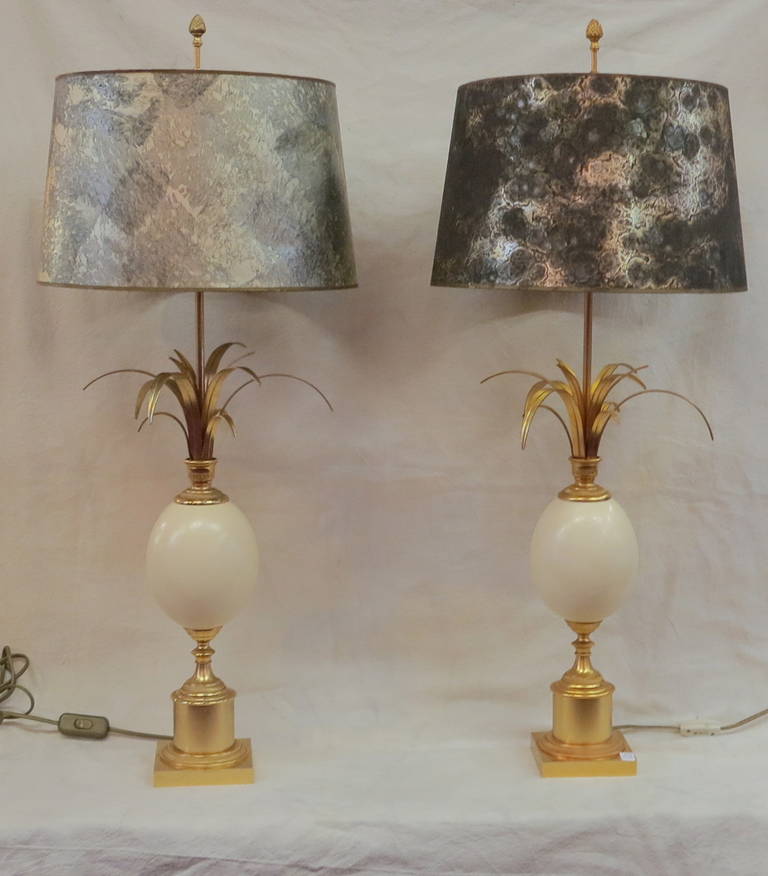 1960s lamps by Maison Charles with ostrich eggs and gilded metal. Diameter without shade 28cm.