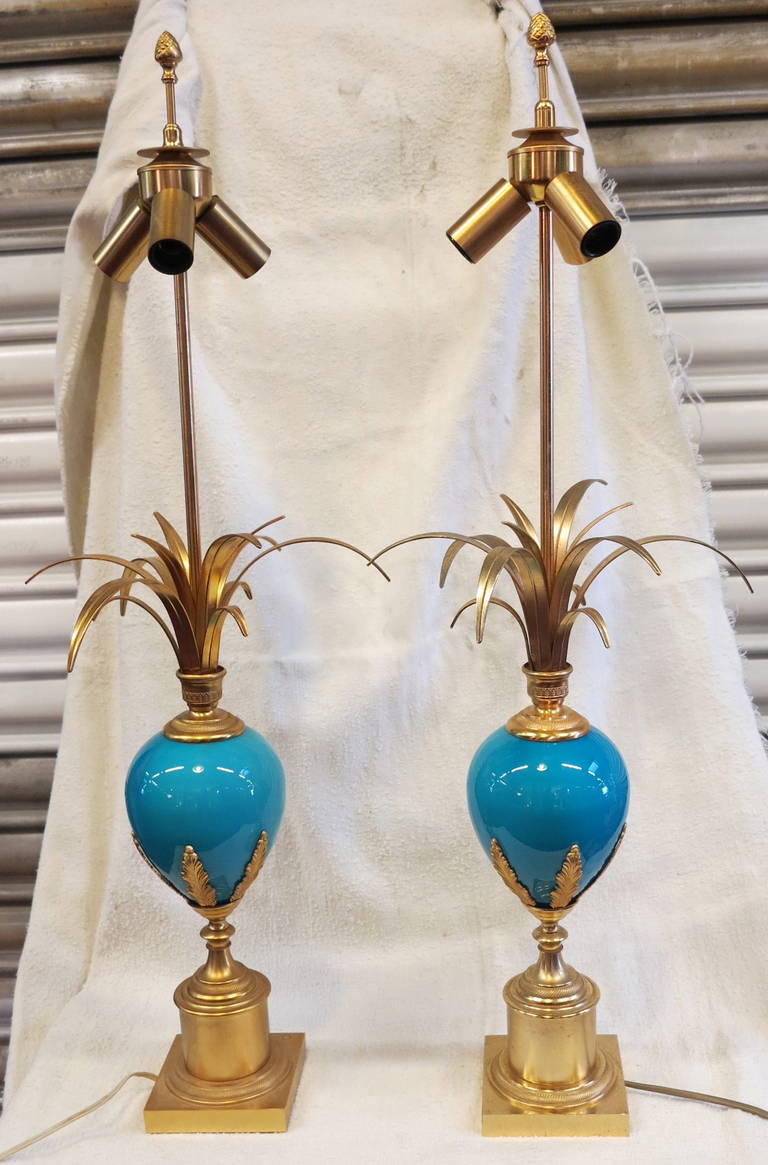 Pair of lamps in the style of  Charles  blue opaline and gilt iron
manufacturing from 1950 to 1970 in good condition
