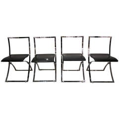 Series of Four Folding Chairs in Chrome-plated Metal