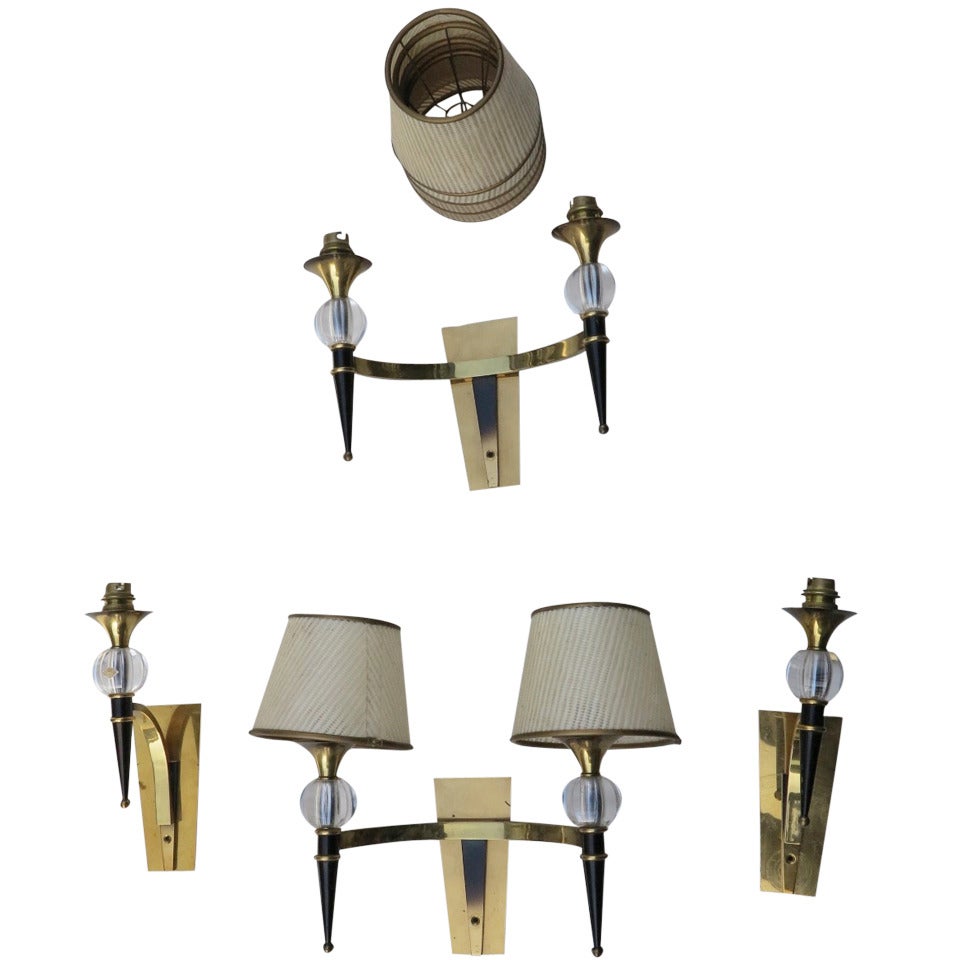 Appliques à la manière de Jacques Adnet
