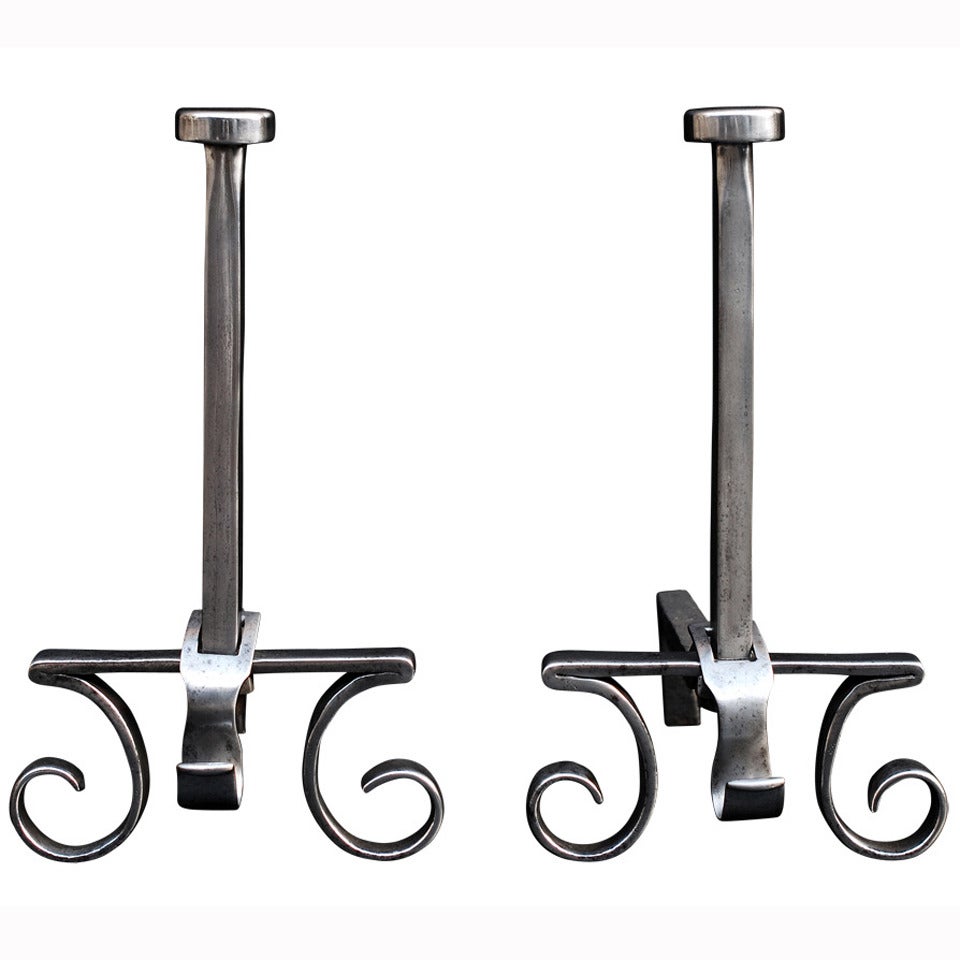 A Pair of Polished Steel Andirons / Firedogs