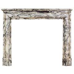 A French Louis XIV Style Mantel in Breche Violette Marble