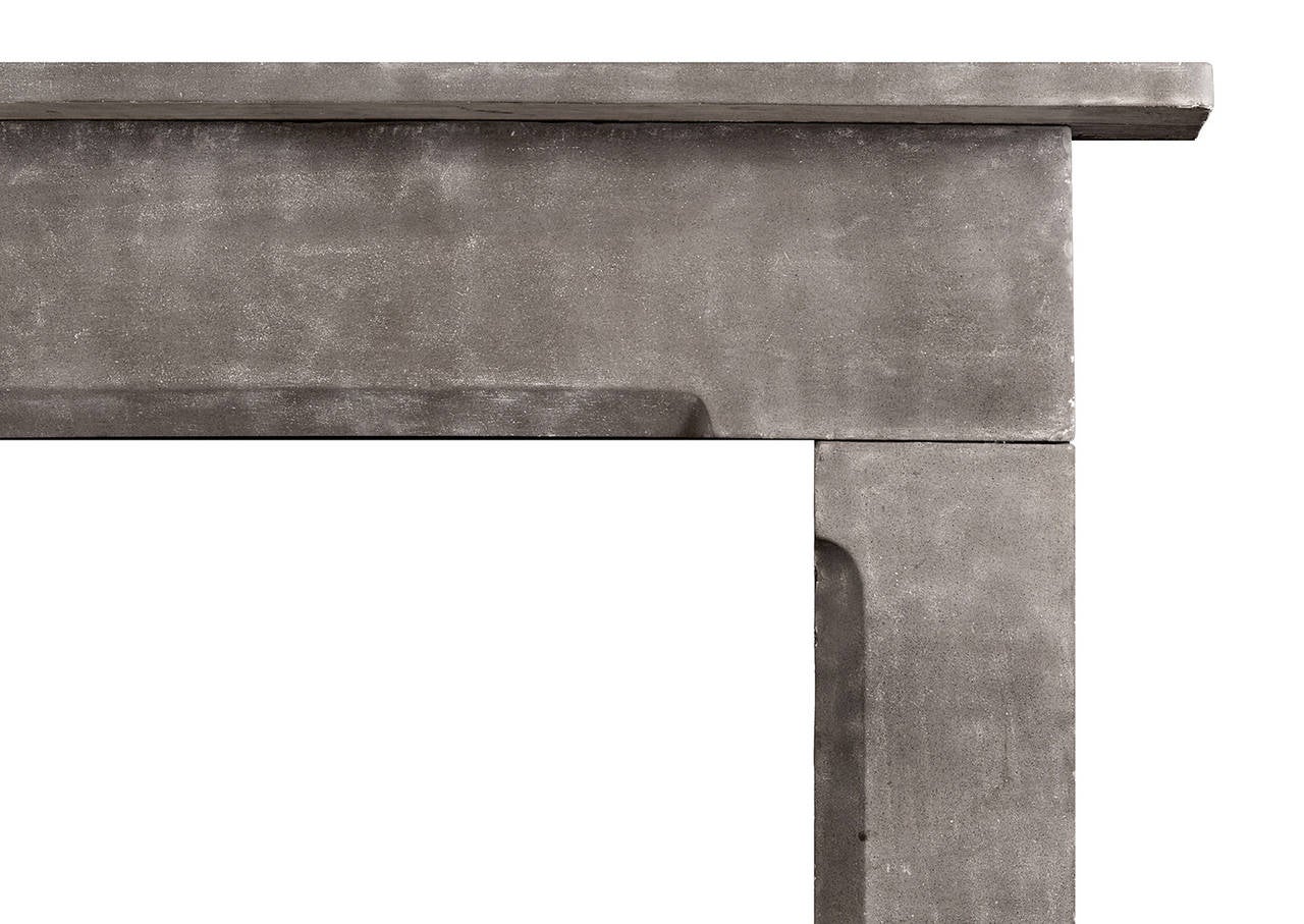 A large English fireplace in grey York stone. The frieze and jambs with moulded ingrounds surmounted by plain shelf, 19th century.

Measure:
Shelf Width:	1940 mm      	76 3/8 in
Overall Height:	1560 mm      	61 3/8 in
Opening Height:	1265 mm     
